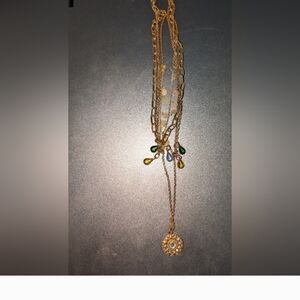 Elegant Triple-Strand Necklace in Coppery Metal with Crystal Teardrops